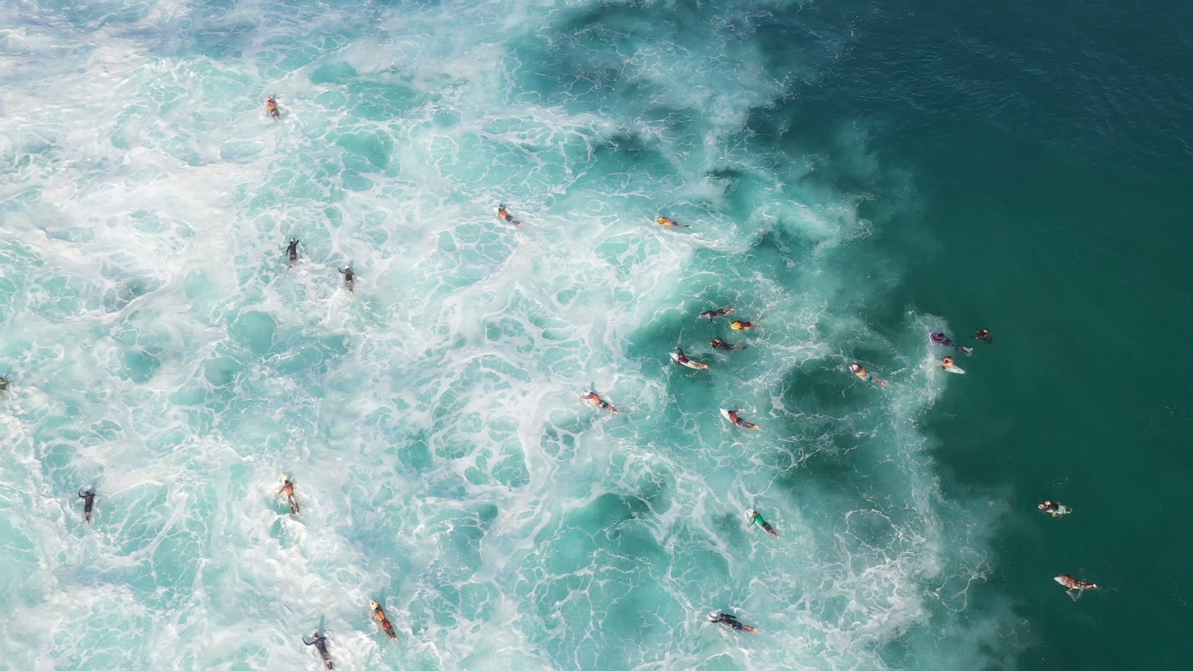 Surf instructor teaching in the waves on Long Island, New York