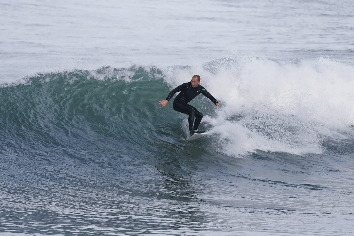 Surfer riding a wave during a private lesson in Montauk