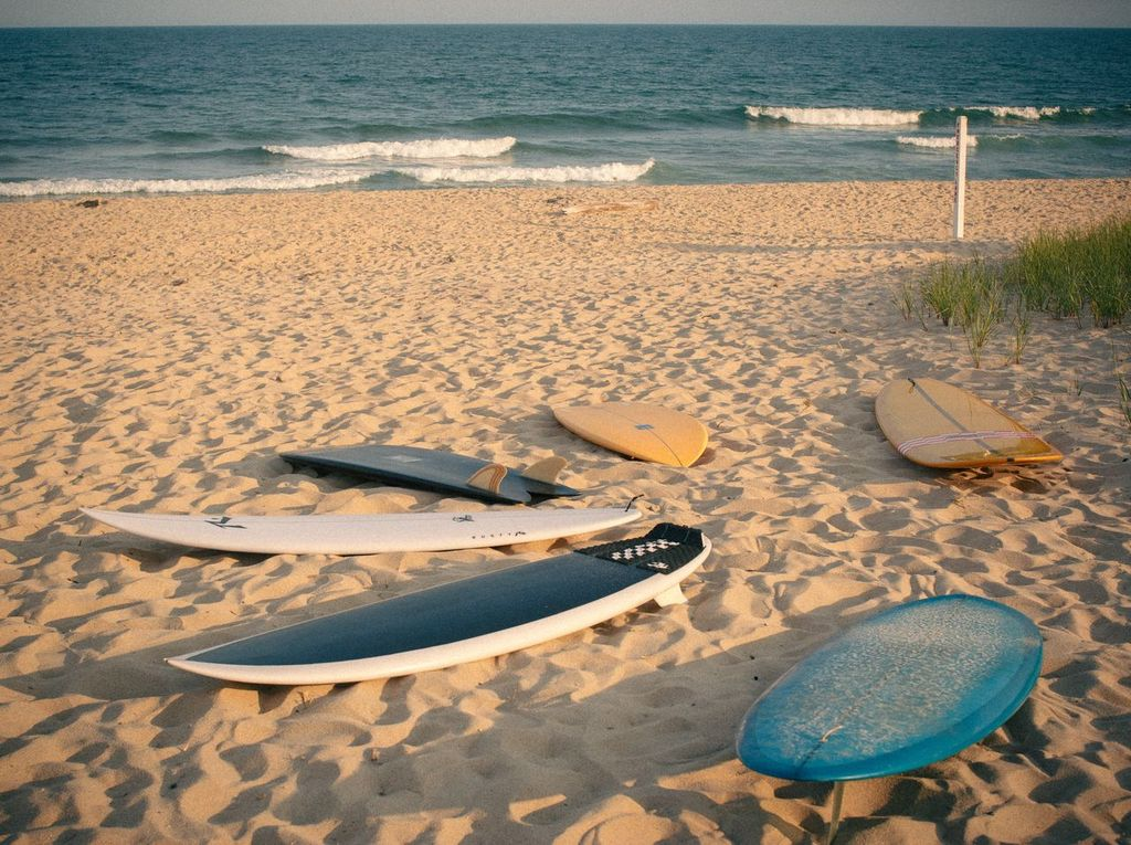 Surfboard on the beach with ocean view